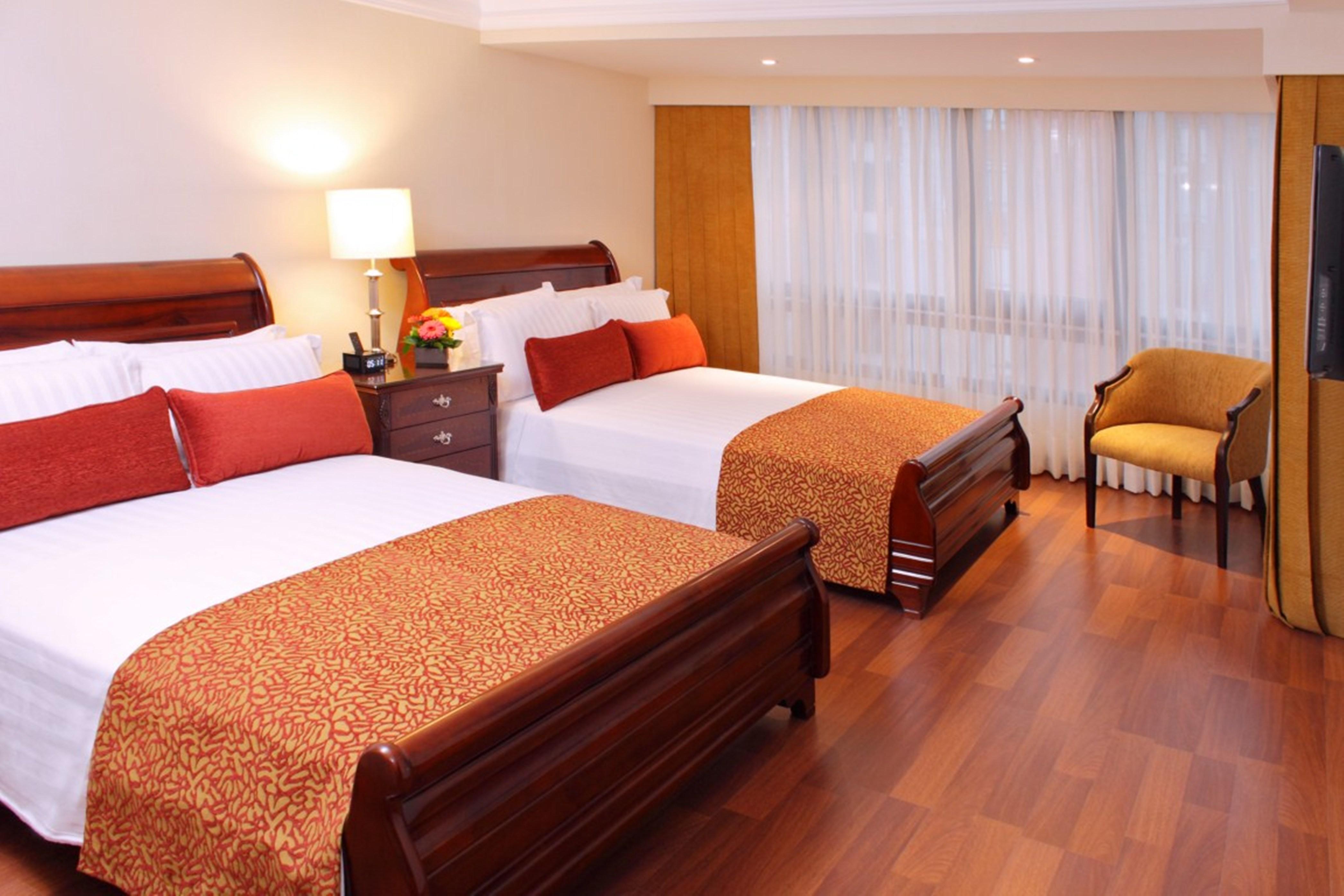 Hotel Estelar La Fontana Bogota Bagian luar foto A room at the hotel
