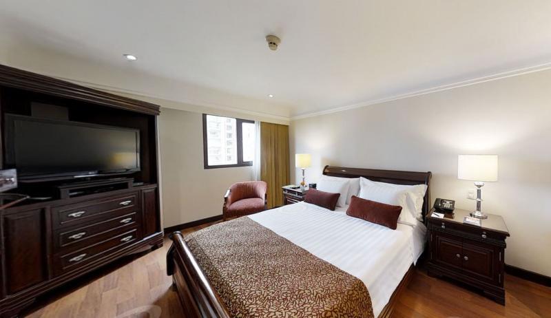 Hotel Estelar La Fontana Bogota Bagian luar foto A bedroom at the hotel